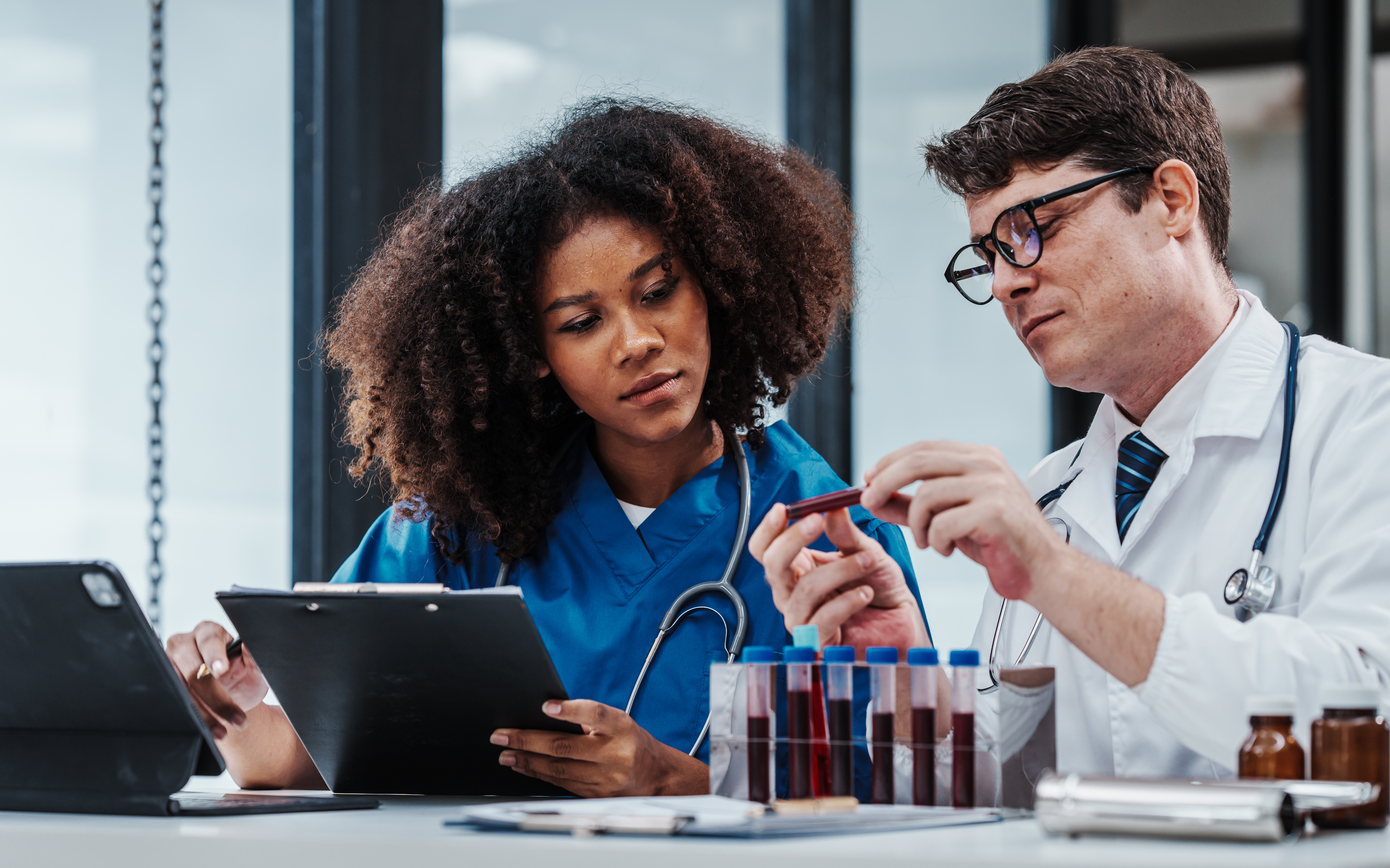 Team meeting lab assistant african american people holding test tube with blood sample research and development of antiretroviral drugs, diabetes, osteoporosis, Monkeypox, Anxiety Disorder