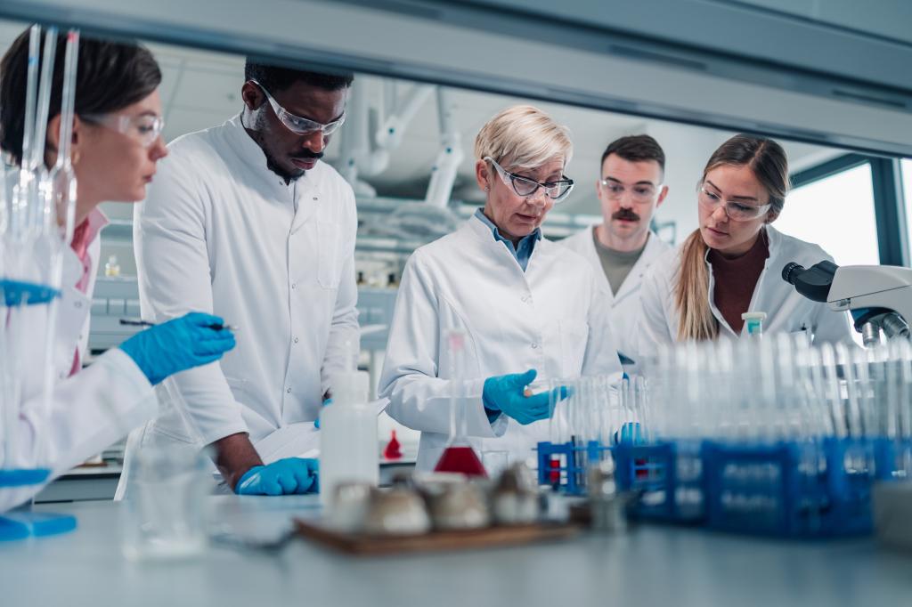 Diverse scientists collaborating on laboratory research and experiments