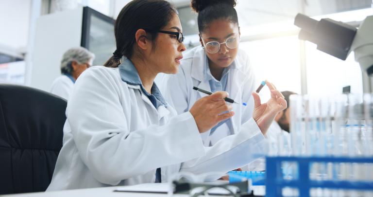 Blood sample, discussion and science with people in laboratory together for medical research. Collaboration, DNA and pharmaceuticals with scientist team at work on clinical trial or investigation