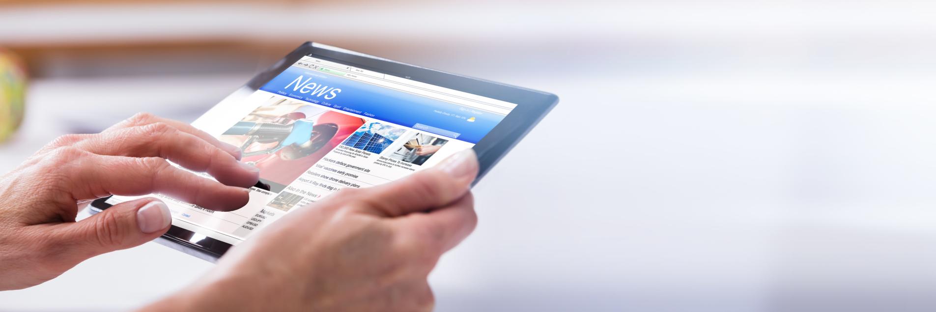 Close-up Of A Person’s Hand Using Digital Tablet
