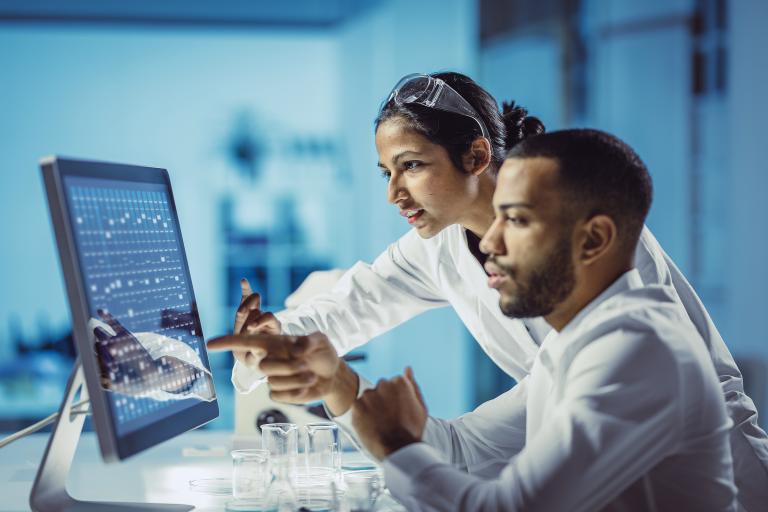 Scientists Working in The Laboratory, Using Touch Screen